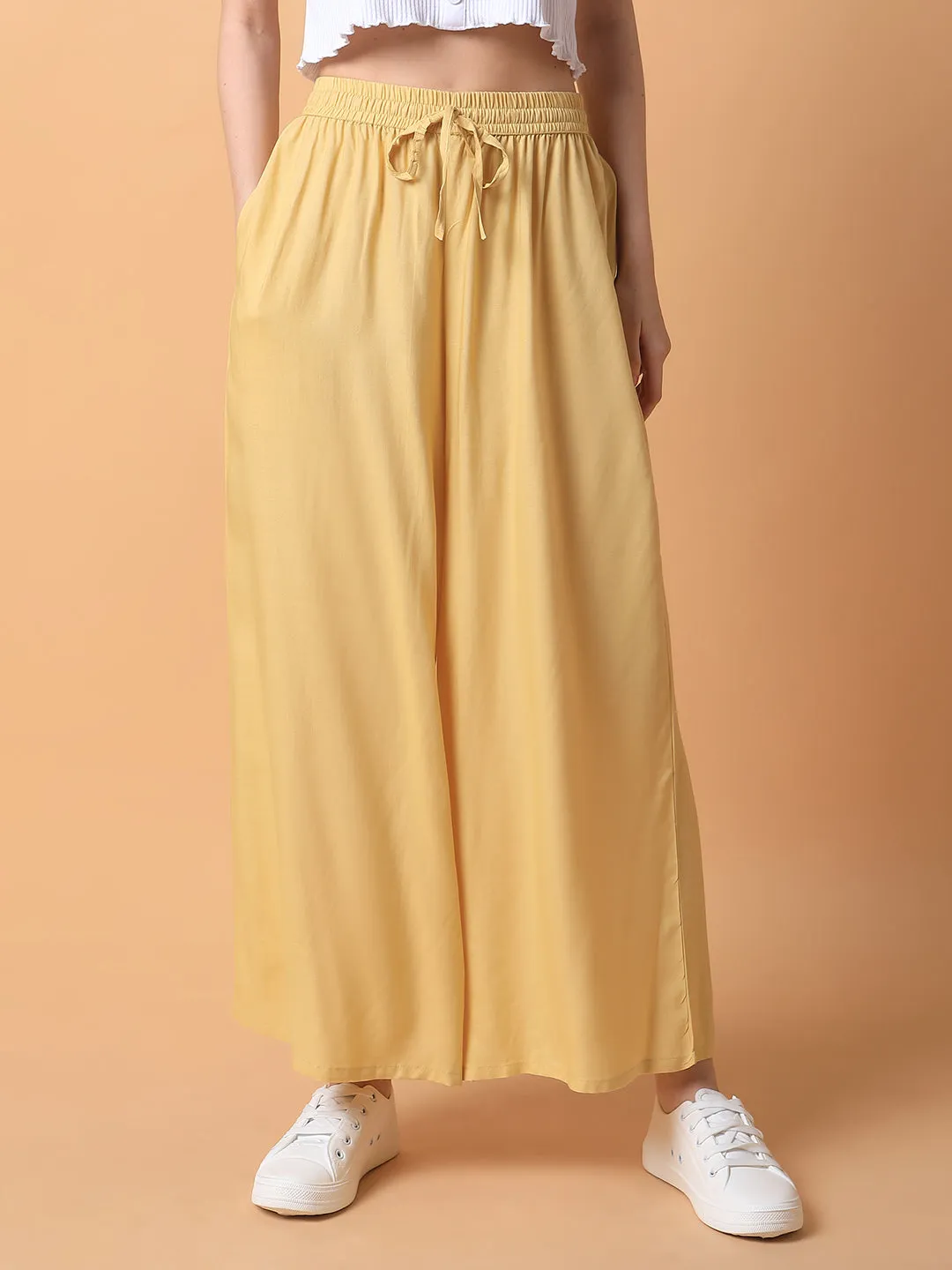 Women Yellow Solid Pleated Loose Fit Palazzos