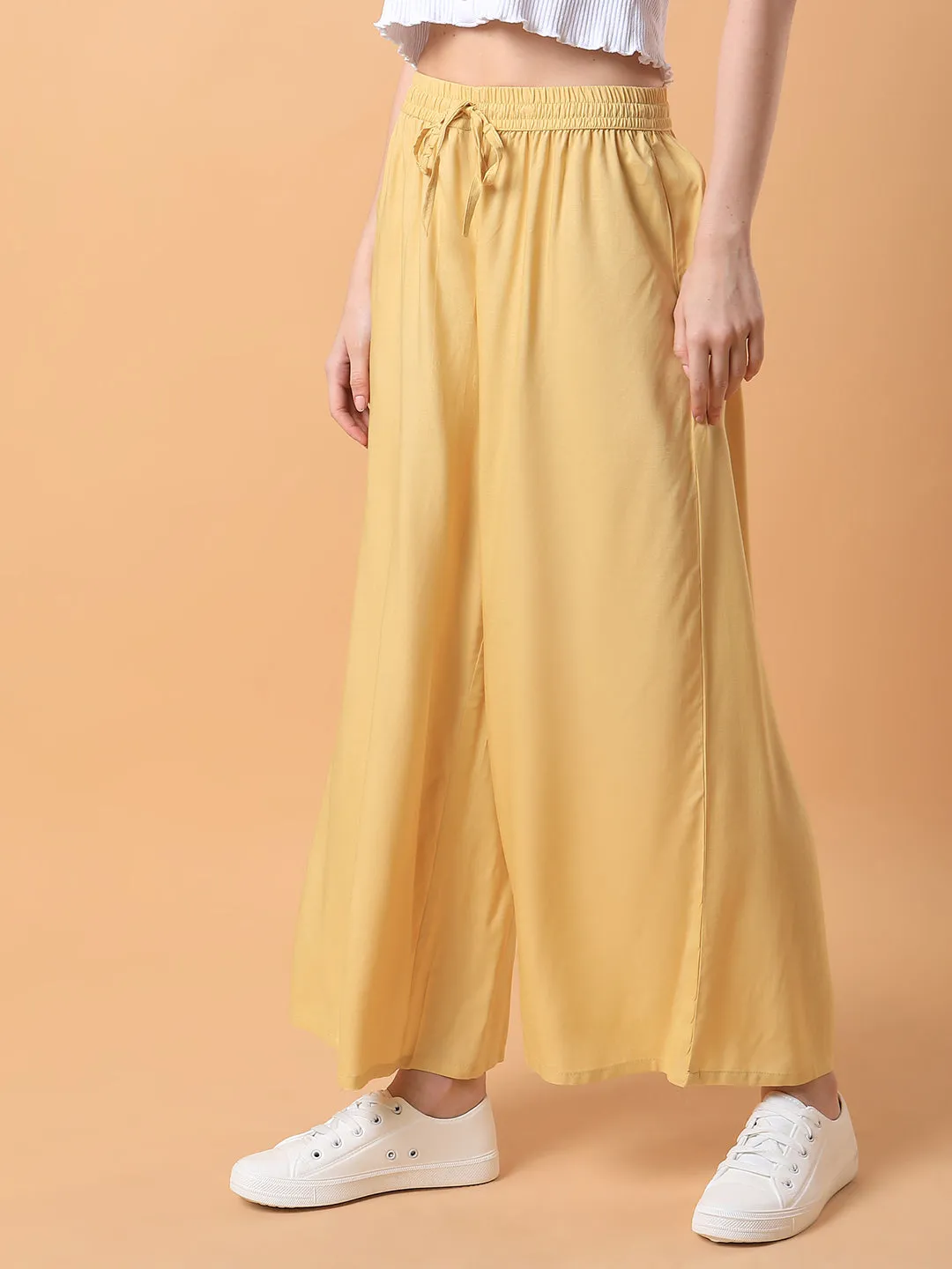Women Yellow Solid Pleated Loose Fit Palazzos